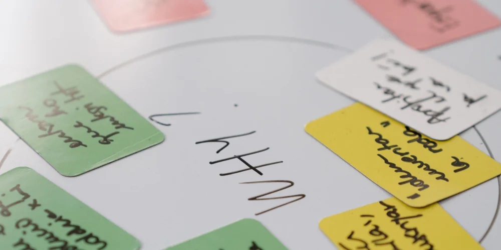Colorful sticky notes on an ASCEN working table